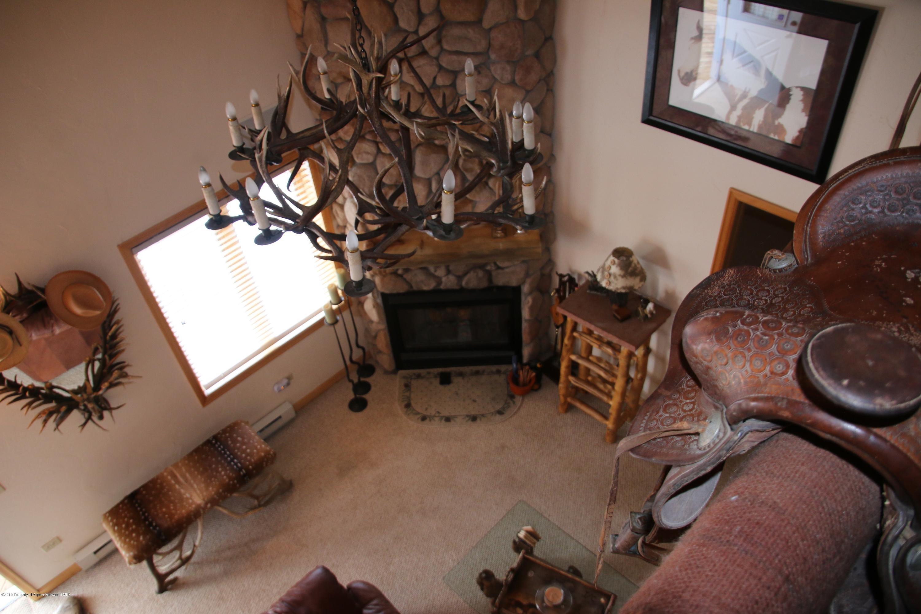 4000 Juniper Hill Road Aspen, CO 81611 - Photo 55 of 63 a living room with furniture and a fireplace