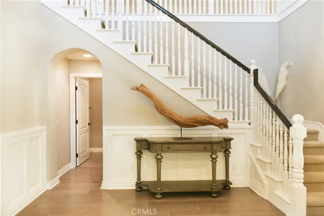 a view of entryway with wooden floor