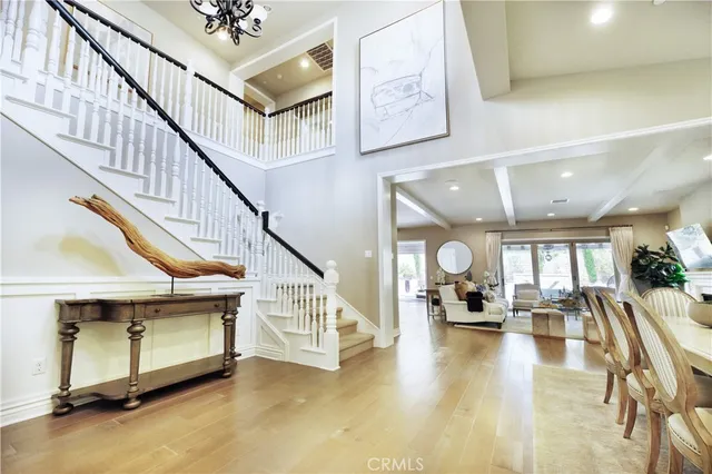 a view of an entryway livingroom and hall