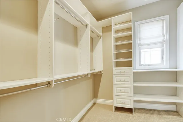 a view of a chairs and table in the patio