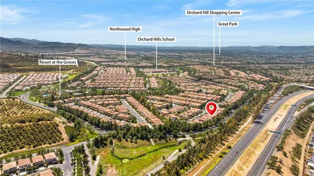a view of a patio with table and chairs and potted plants