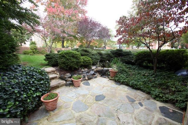 5102 Roland Avenue Baltimore, MD 21210 - Photo 20 of 27 side patio w/fishpond