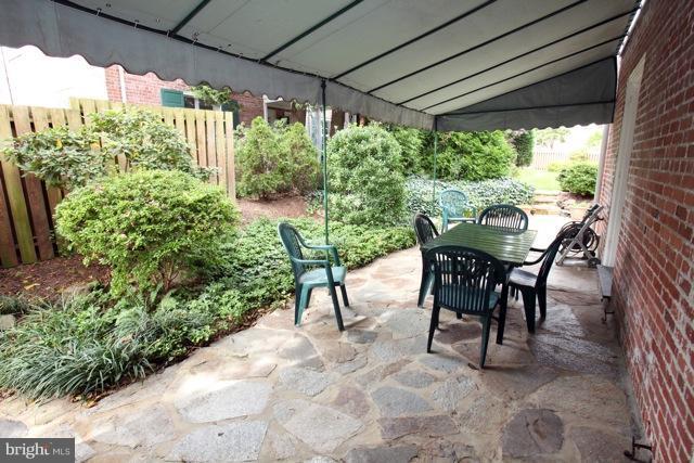 5102 Roland Avenue Baltimore, MD 21210 - Photo 26 of 27 Covered flagstone patio