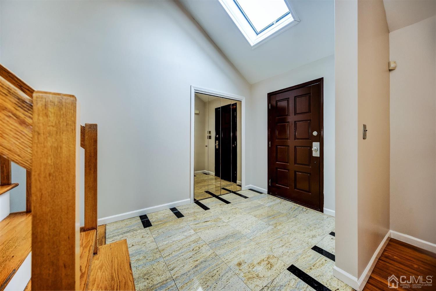 19 Greenwich Road Edison, NJ 08820 - Photo 2 of 39 a bedroom with a bed and a window