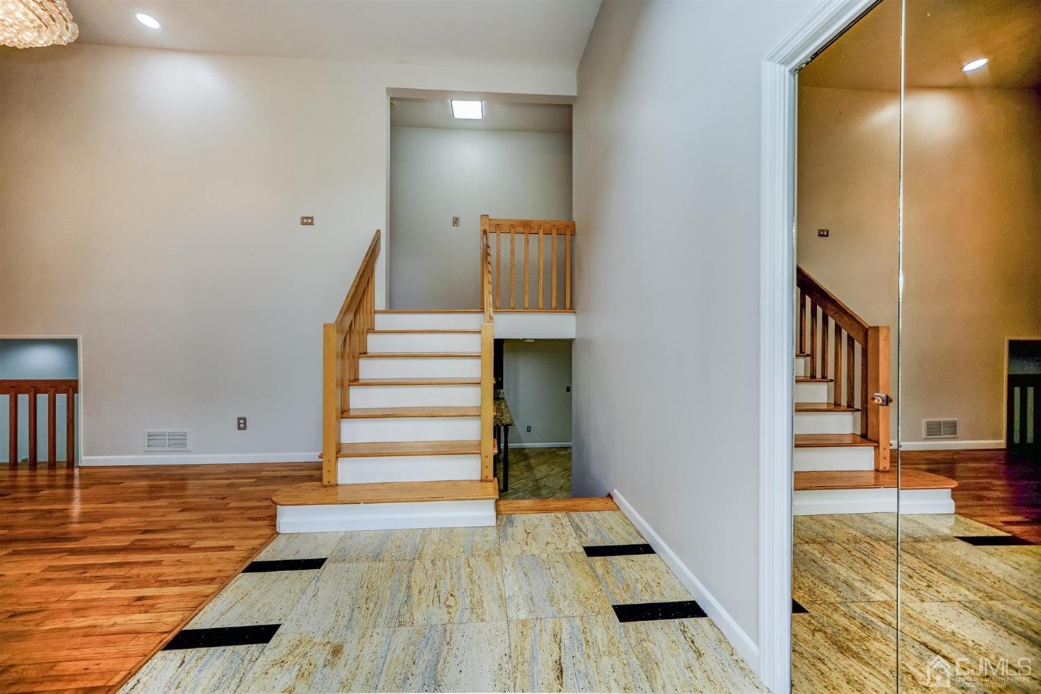 19 Greenwich Road Edison, NJ 08820 - Photo 3 of 39 a view of entryway and hall with wooden floor