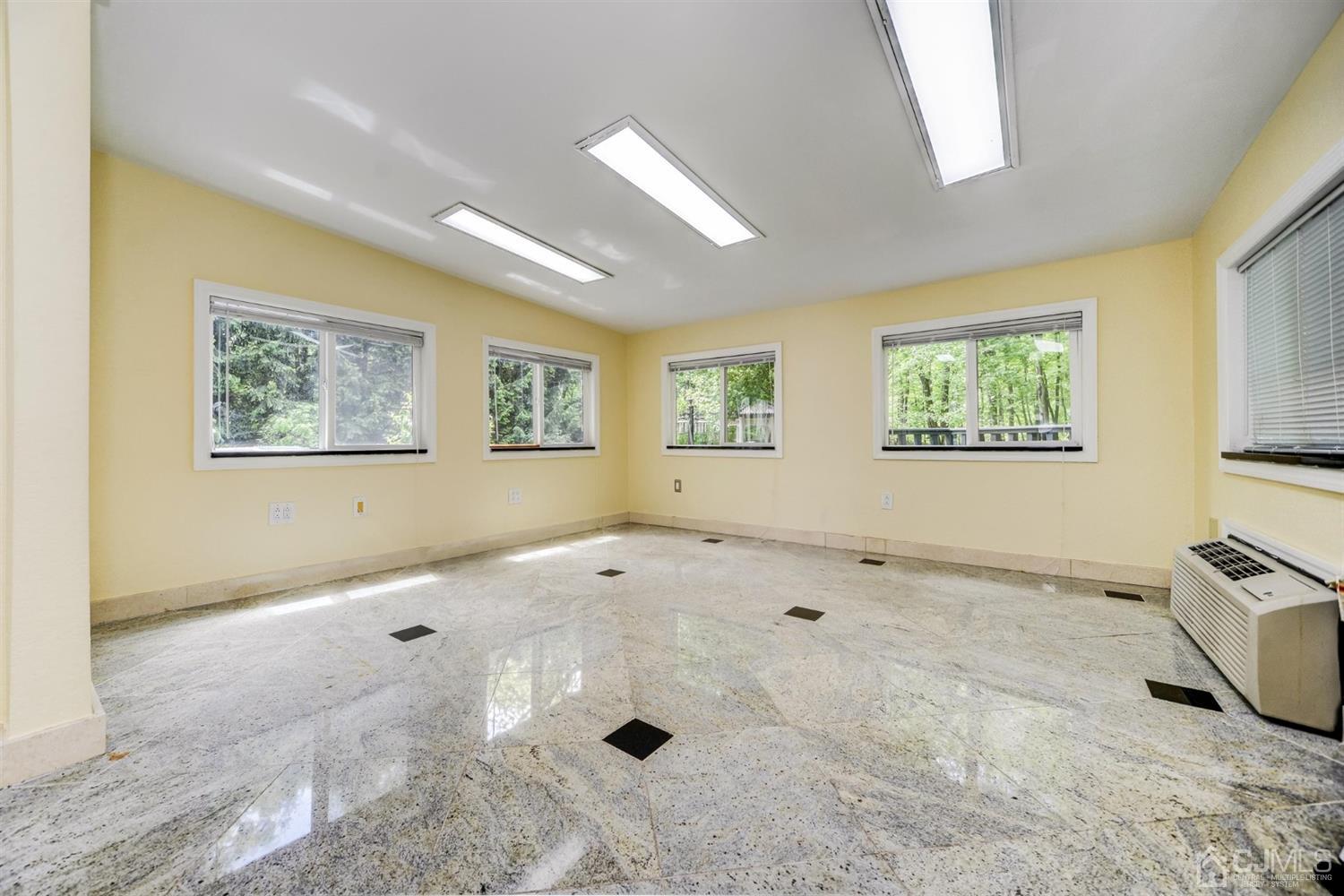 19 Greenwich Road Edison, NJ 08820 - Photo 21 of 39 a view of an empty room with a window