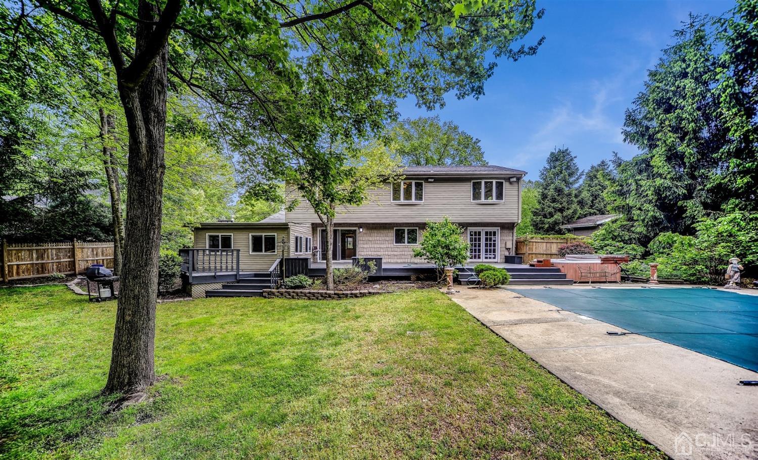 19 Greenwich Road Edison, NJ 08820 - Photo 24 of 39 a view of a house with swimming pool and sitting area