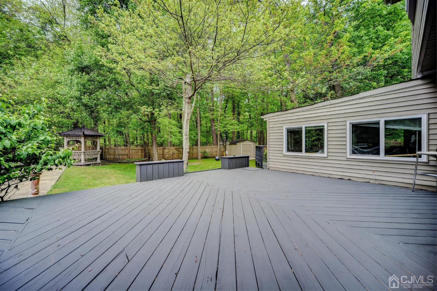 19 Greenwich Road Edison, NJ 08820 - Photo 25 of 39 a view of a house with a yard