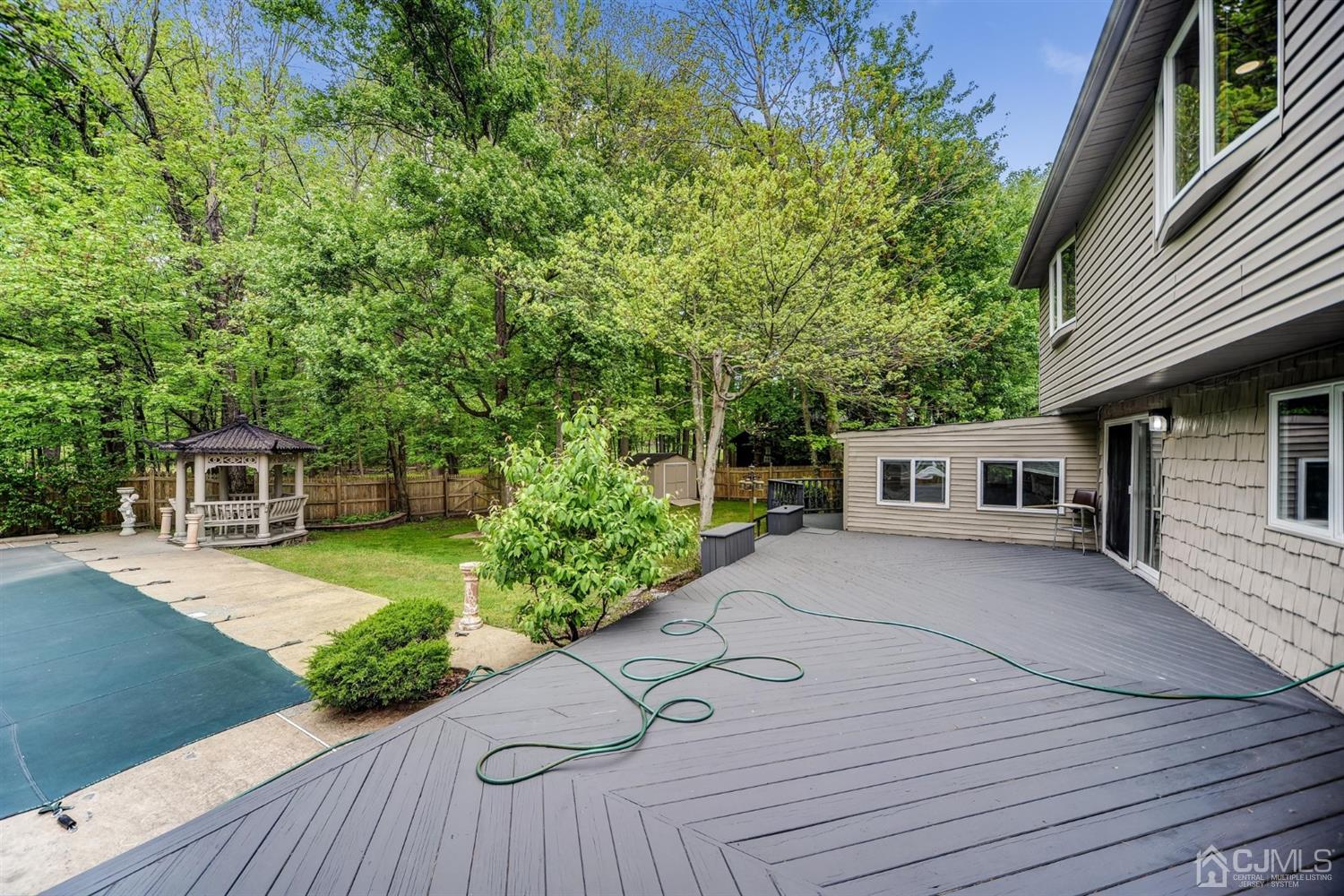 19 Greenwich Road Edison, NJ 08820 - Photo 27 of 39 a front view of a house with garden