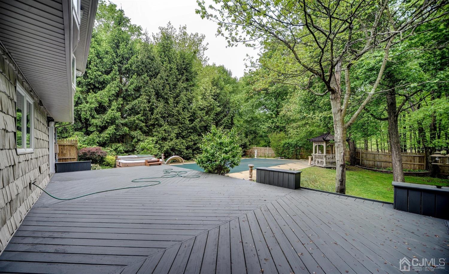 19 Greenwich Road Edison, NJ 08820 - Photo 28 of 39 a view of a backyard with sitting area