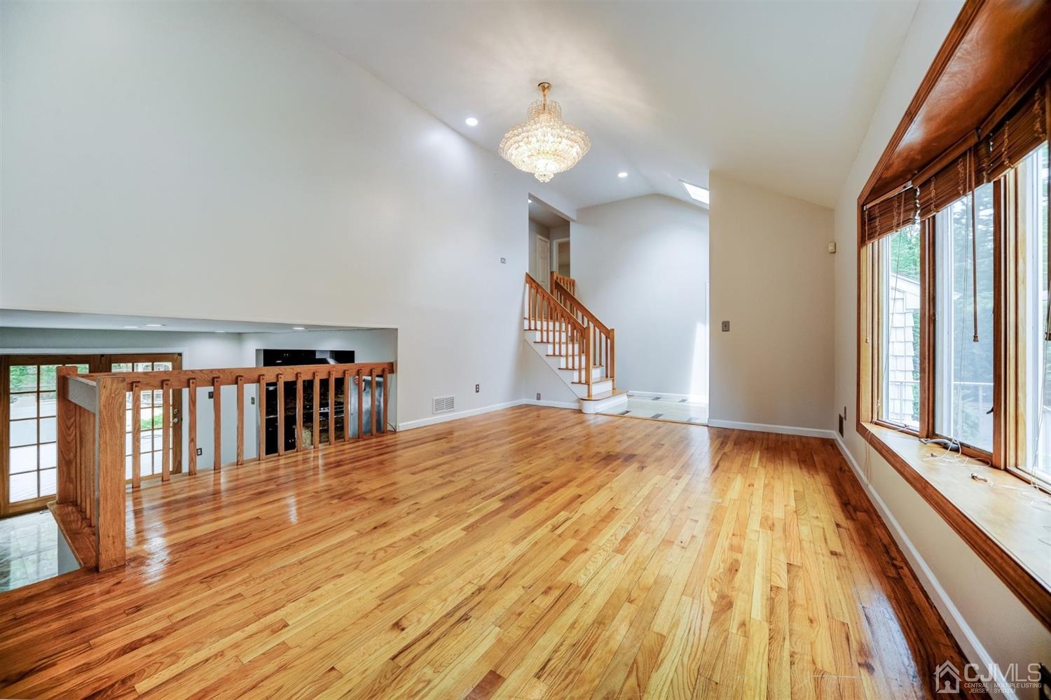 19 Greenwich Road Edison, NJ 08820 - Photo 4 of 39 a view of entryway and hall with wooden floor