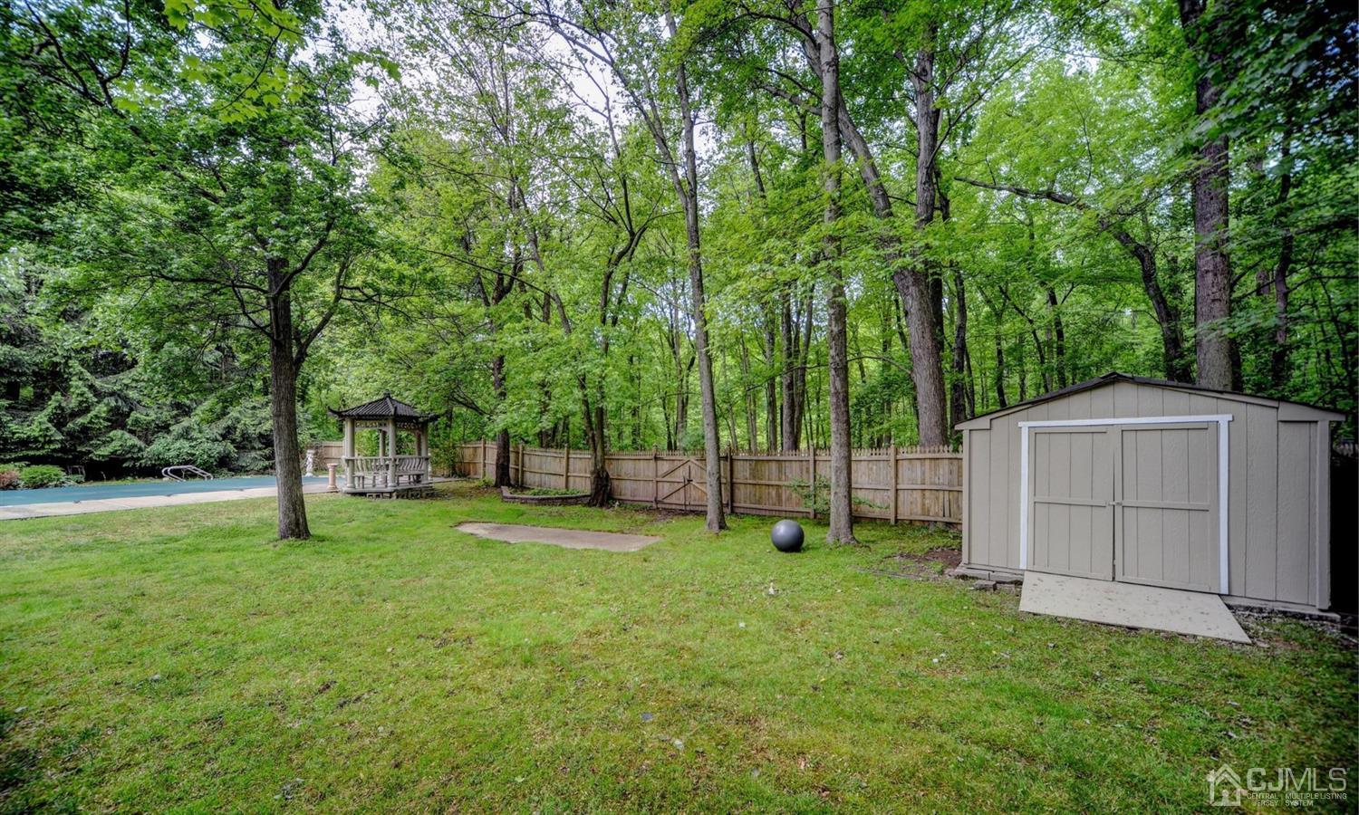 19 Greenwich Road Edison, NJ 08820 - Photo 34 of 39 a view of a backyard with a garden and entertaining space