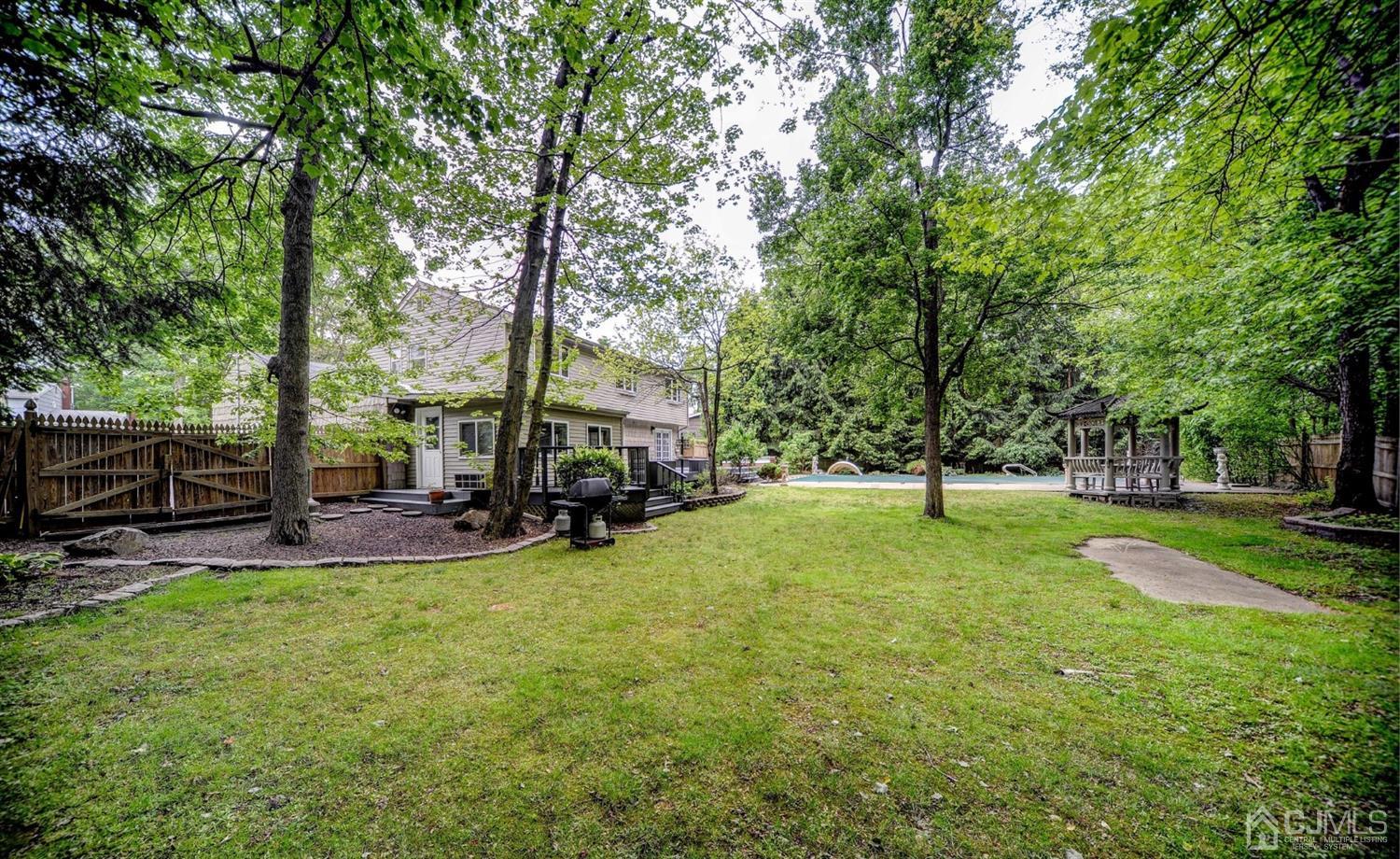 19 Greenwich Road Edison, NJ 08820 - Photo 35 of 39 a view of a park with large trees