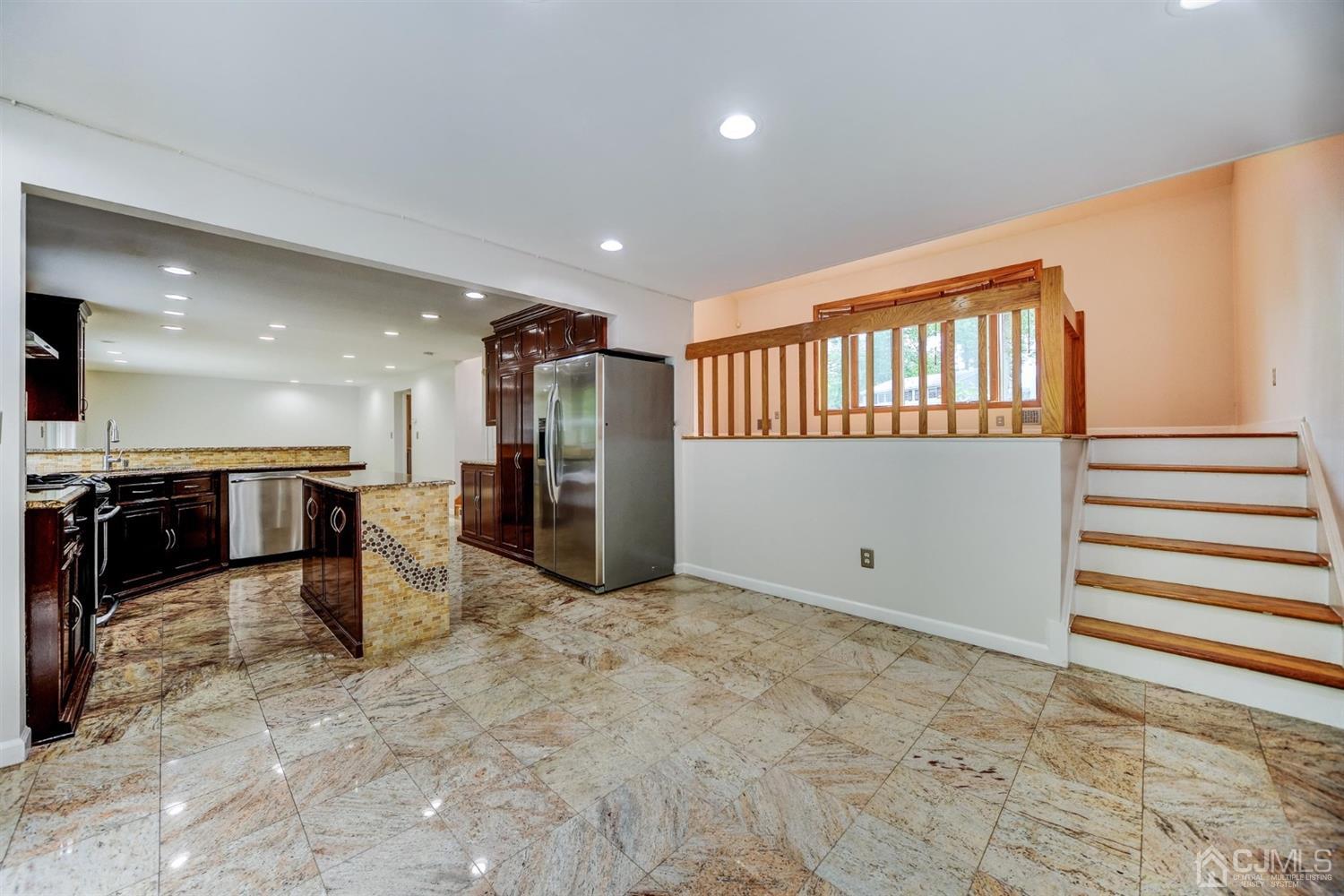 19 Greenwich Road Edison, NJ 08820 - Photo 7 of 39 a view of a hallway with a living room
