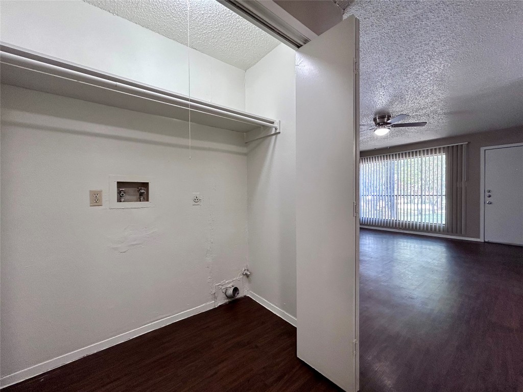1500 No Mor Cove, Unit B Austin, TX 78758 - Photo 17 of 17 an empty room with wooden floor and windows