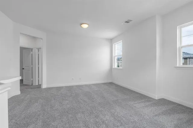 a bathroom with a toilet a sink and bathtub