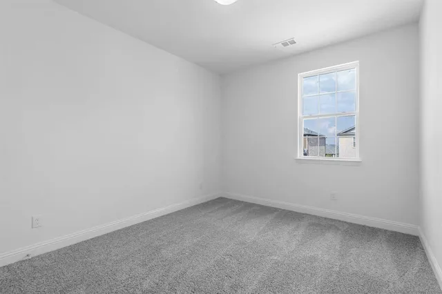 a view of a backyard with a garden and stairs