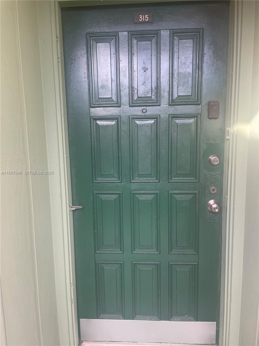 a bathroom with a mirror