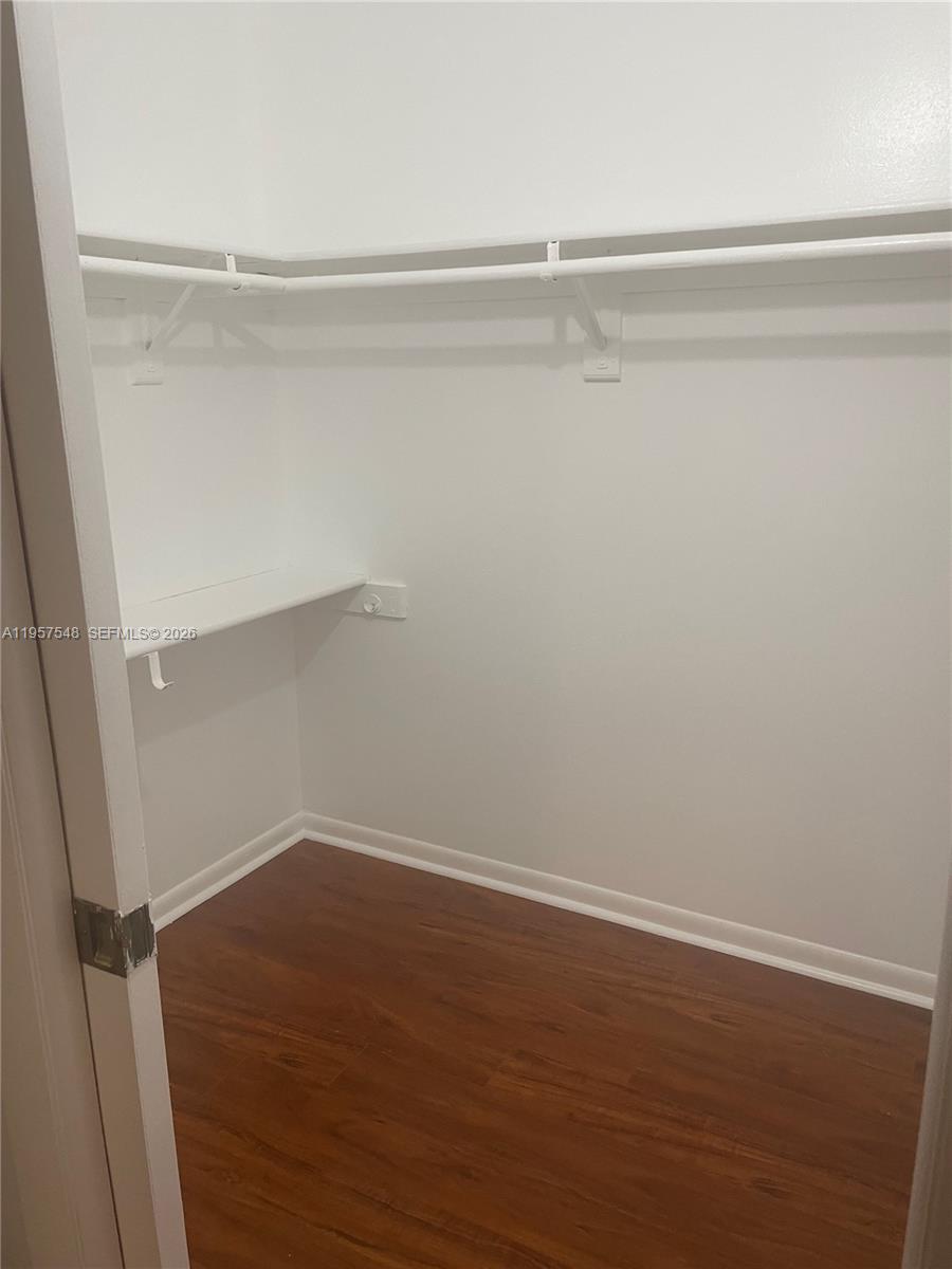 10525 Southwest 112th Avenue, Unit 315 Miami, FL 33176 - Photo 6 of 9 a view of an empty walk in closet