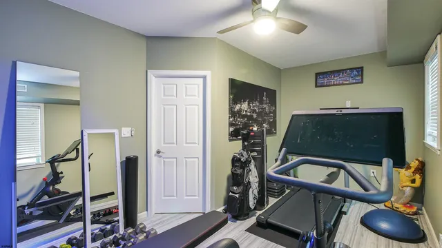 a view of a workspace with furniture