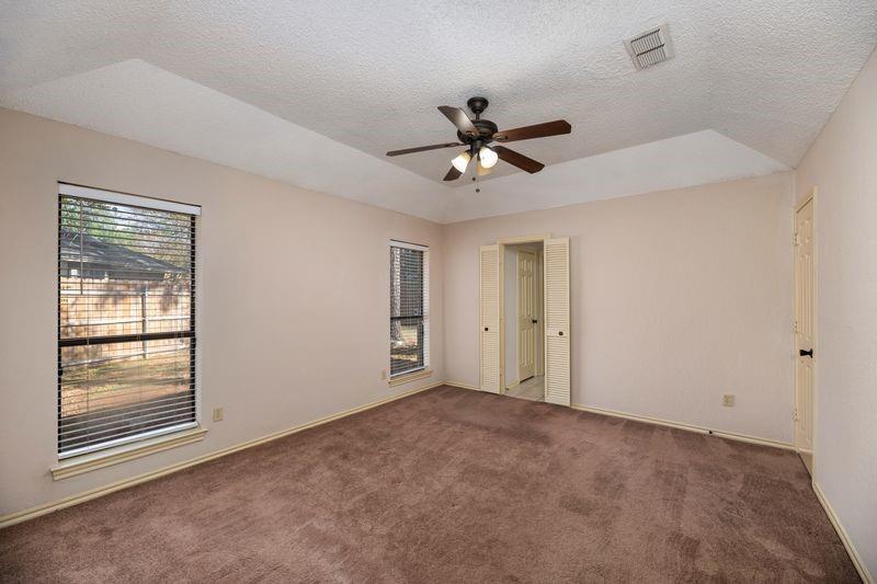 922 Kingston Drive Mansfield, TX 76063 - Photo 17 of 24 a view of an empty room with a window