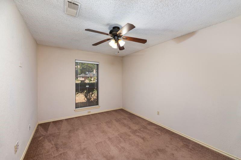 922 Kingston Drive Mansfield, TX 76063 - Photo 20 of 24 a view of an empty room with a window