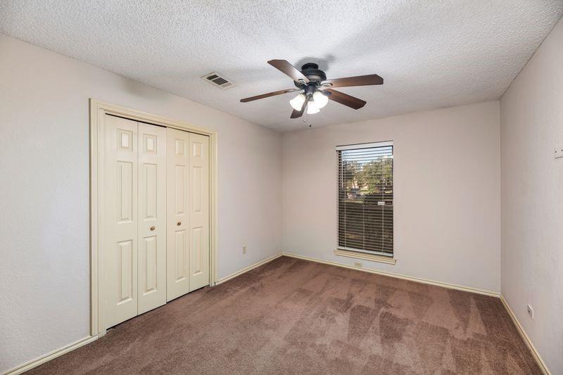 922 Kingston Drive Mansfield, TX 76063 - Photo 21 of 24 a view of an empty room with a window