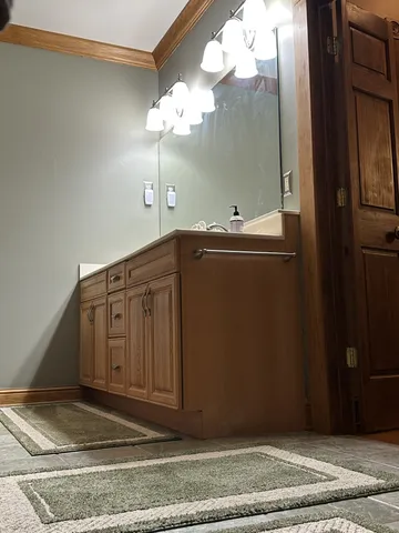 a bathroom with a shower and a shower