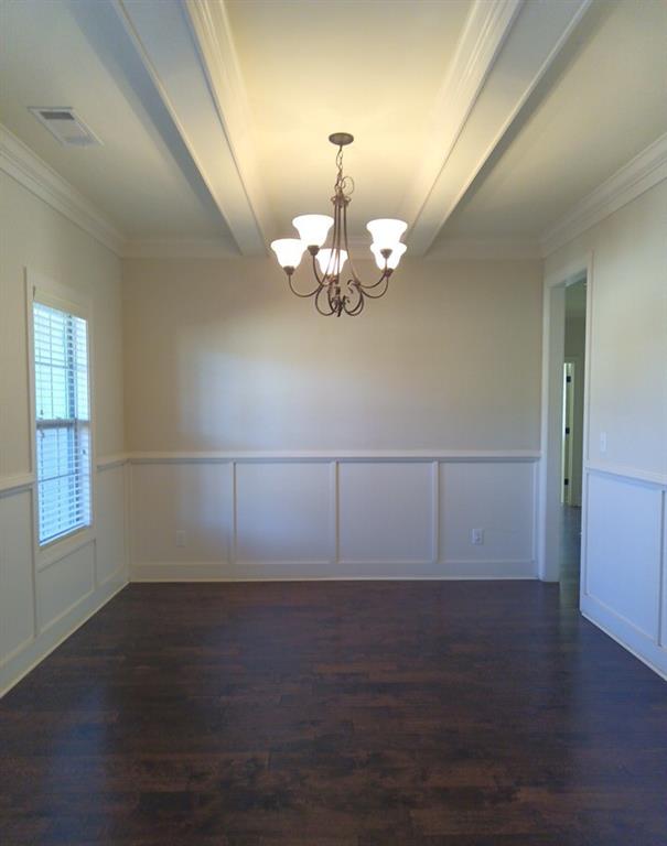 307 Cinnamon Bark Pass Locust Grove, GA 30248 - Photo 12 of 26 an empty room with wooden floor fan and window