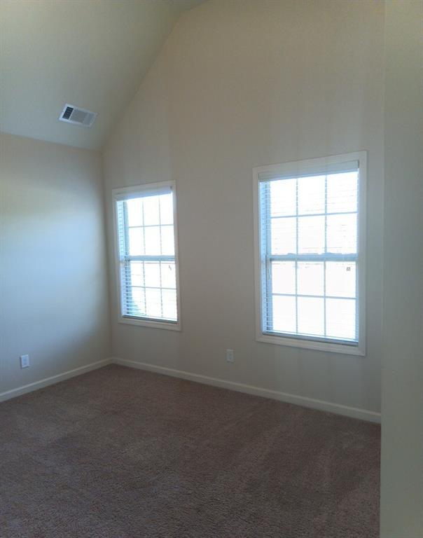 307 Cinnamon Bark Pass Locust Grove, GA 30248 - Photo 18 of 26 an empty room with a window
