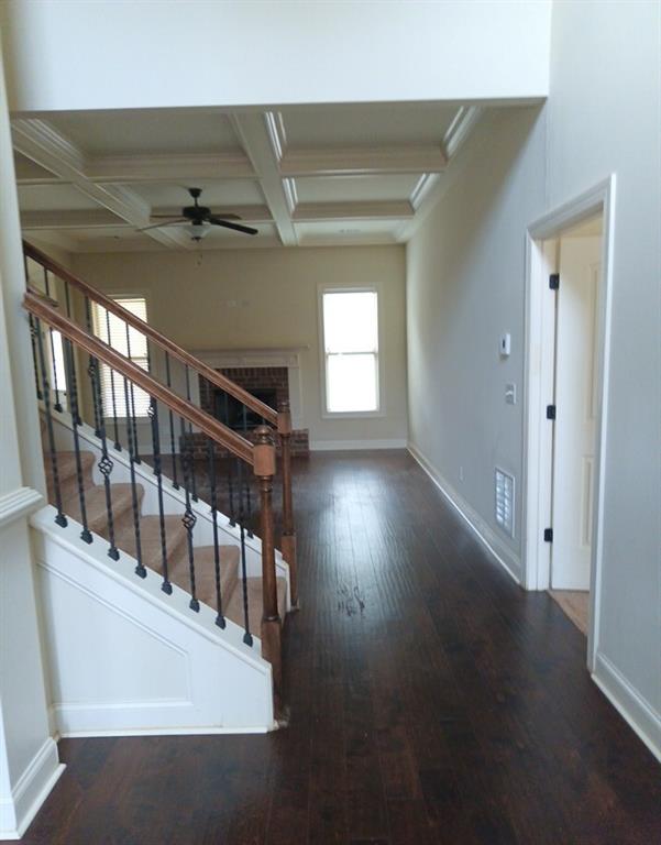 307 Cinnamon Bark Pass Locust Grove, GA 30248 - Photo 2 of 26 a view of an entryway with wooden floor