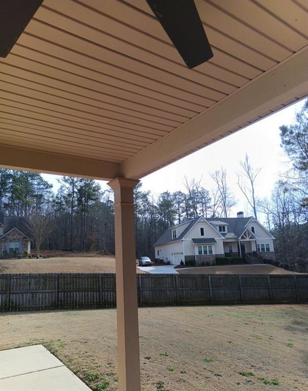 307 Cinnamon Bark Pass Locust Grove, GA 30248 - Photo 4 of 26 a view of house with a yard