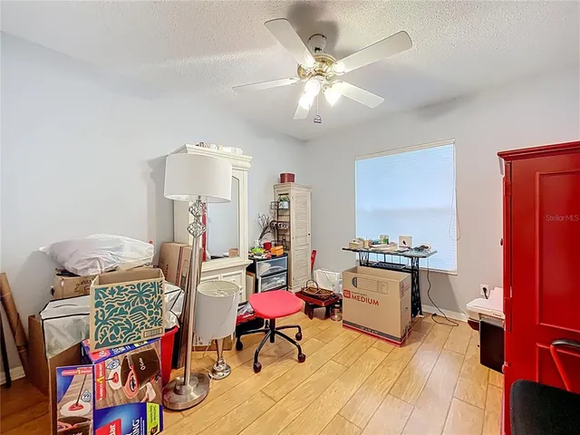 a spacious bathroom with a double vanity sink and mirror