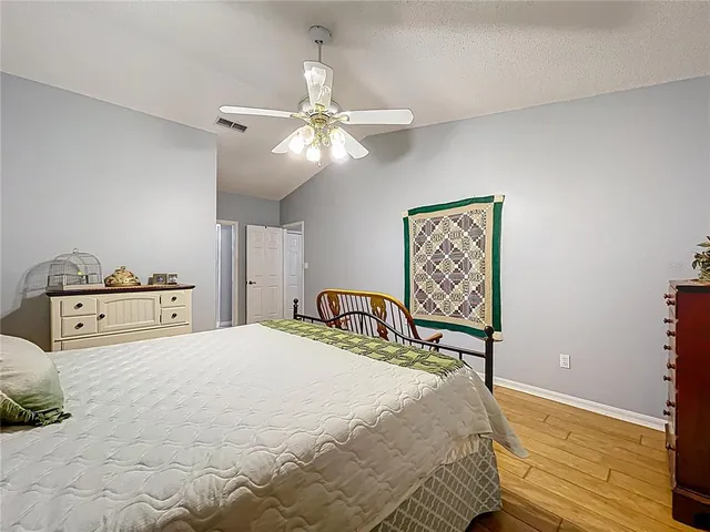 a view of a house with backyard porch and sitting area
