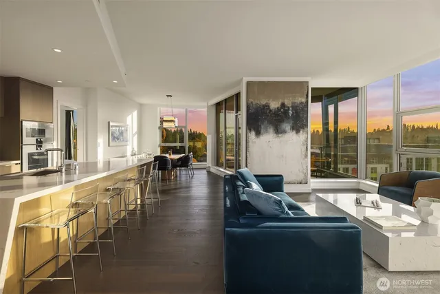 a kitchen with sink stove and cabinets