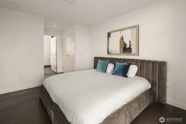 a bathroom with a double vanity sink and mirror