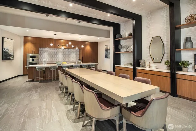 a living room with furniture a wooden floor and a window