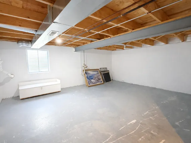 a view of a room with wooden walls