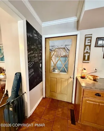 a bathroom with a sink and mirror