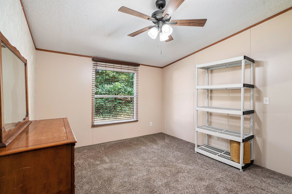 359 Norton Bridge Road Chatsworth, GA 30705 - Photo 18 of 28 a view of an empty room with a window