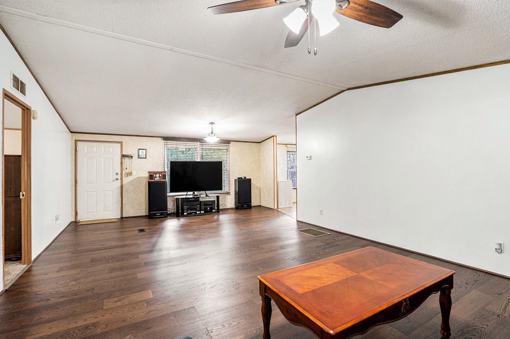 359 Norton Bridge Road Chatsworth, GA 30705 - Photo 5 of 28 a view of a room with wooden floor