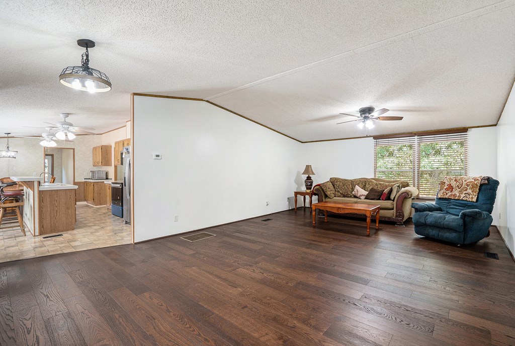 359 Norton Bridge Road Chatsworth, GA 30705 - Photo 6 of 28 a view of a livingroom with furniture and a window