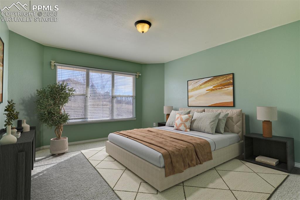 Undisclosed Address Colorado Springs, CO 80921 - Photo 15 of 49 a bedroom with a bed and a window