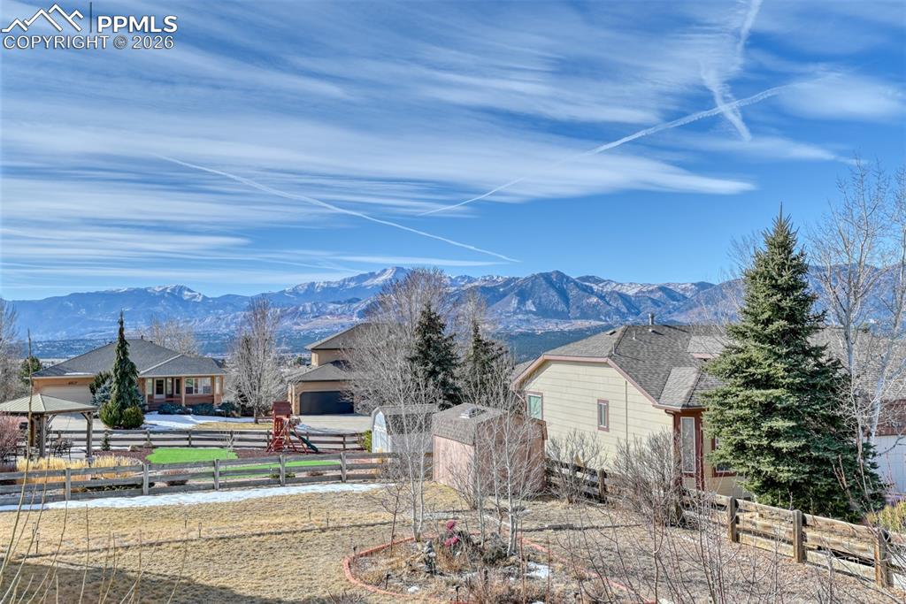 Undisclosed Address Colorado Springs, CO 80921 - Photo 2 of 49 a view of a house with a patio and a yard