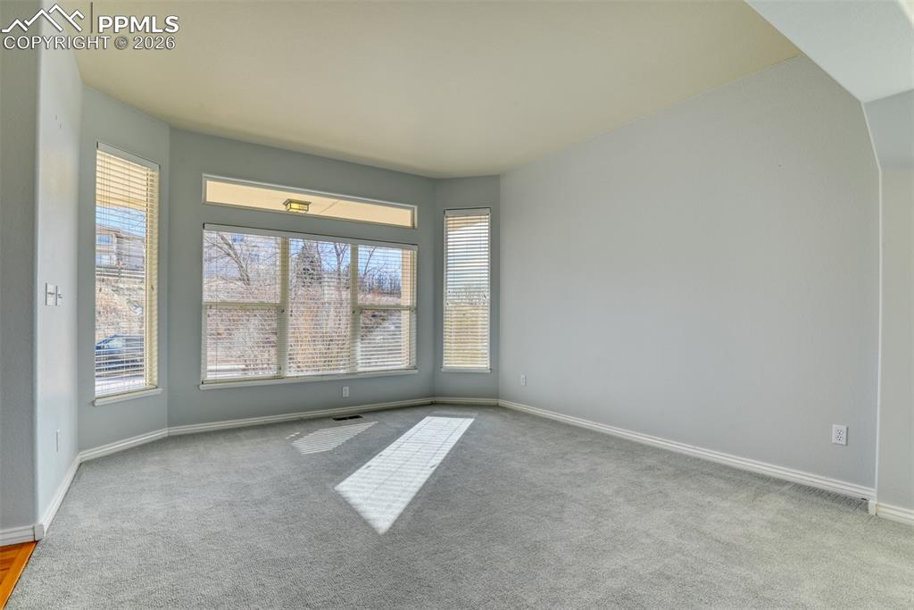 Undisclosed Address Colorado Springs, CO 80921 - Photo 29 of 49 a view of an empty room with a window