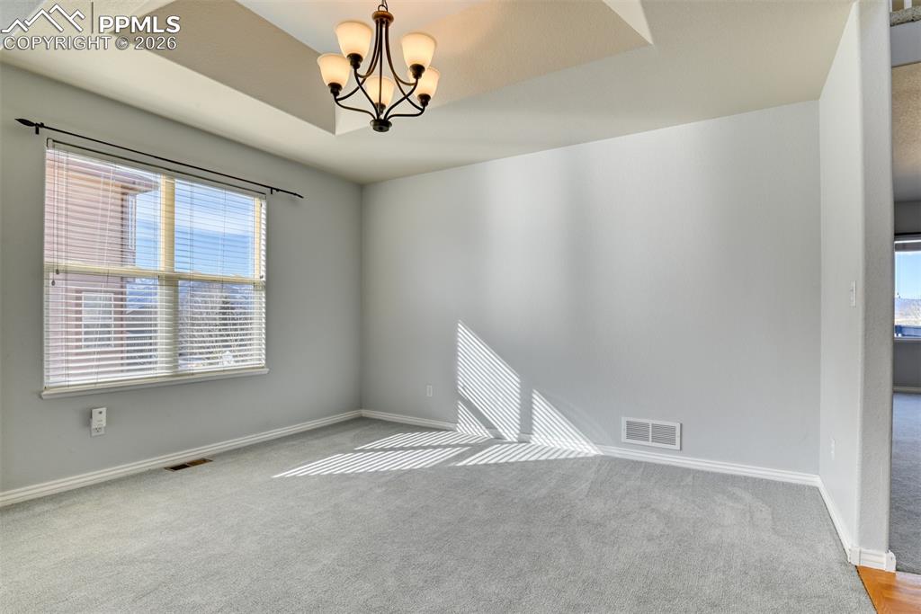 Undisclosed Address Colorado Springs, CO 80921 - Photo 32 of 49 a view of an empty room with a window