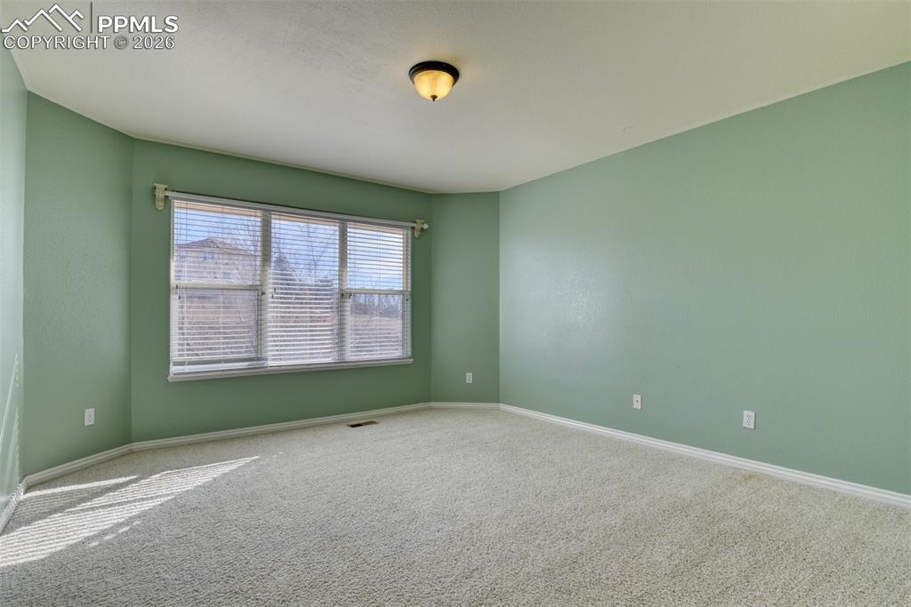 Undisclosed Address Colorado Springs, CO 80921 - Photo 39 of 49 a view of an empty room with a window