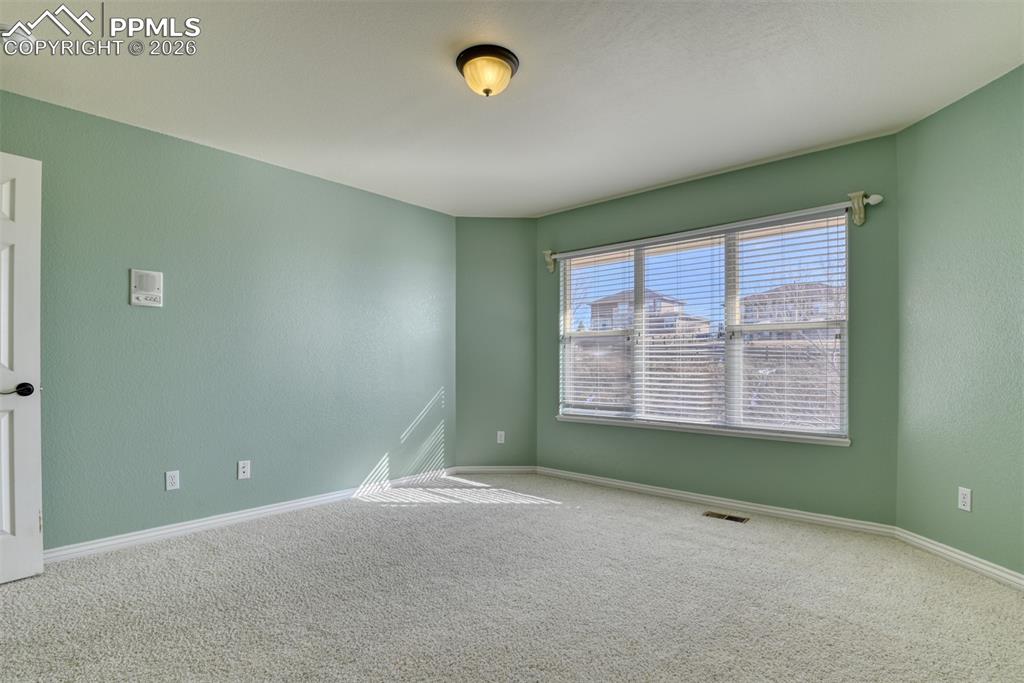 Undisclosed Address Colorado Springs, CO 80921 - Photo 40 of 49 a view of an empty room with a window