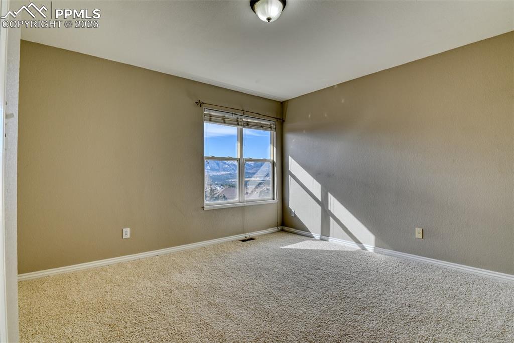 Undisclosed Address Colorado Springs, CO 80921 - Photo 41 of 49 a view of an empty room with a window