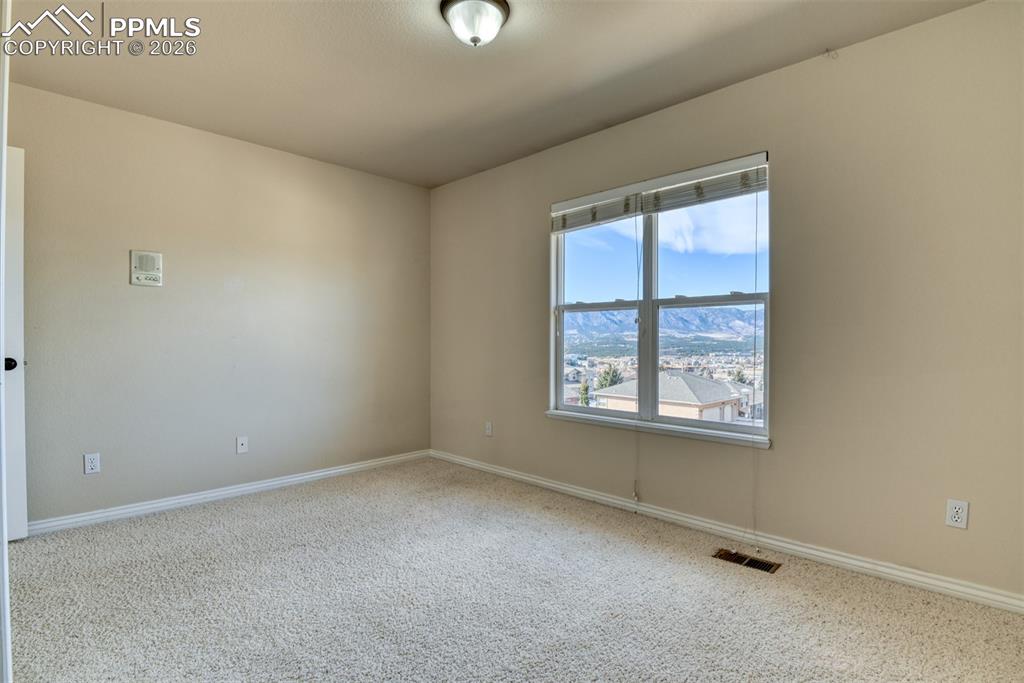 Undisclosed Address Colorado Springs, CO 80921 - Photo 44 of 49 an empty room with a window